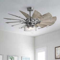 The UHP9481 Tuscan Indoor Ceiling Fan by Urban Ambiance, part of the Saybrook Collection, features a modern yet rustic design with wooden and metallic blades in an Antique Nickel finish. It elegantly enhances rooms with white walls and windows at 24-1/8''H x 52"W x 52''D.