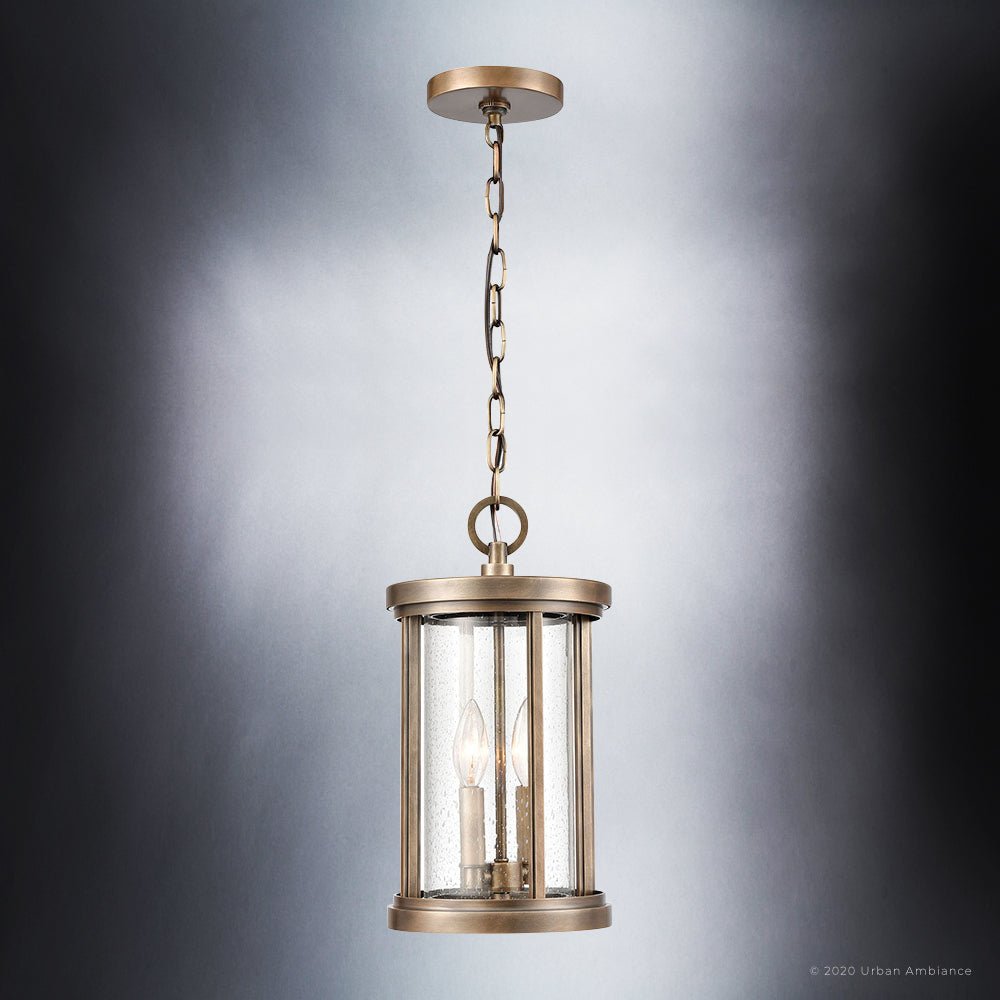 https://www.urbanambiance.com/cdn/shop/products/uex1048-nautical-pendant-15h-x-8w-antique-brass-finish-rockland-collection-359508_1400x.jpg?v=1649272499